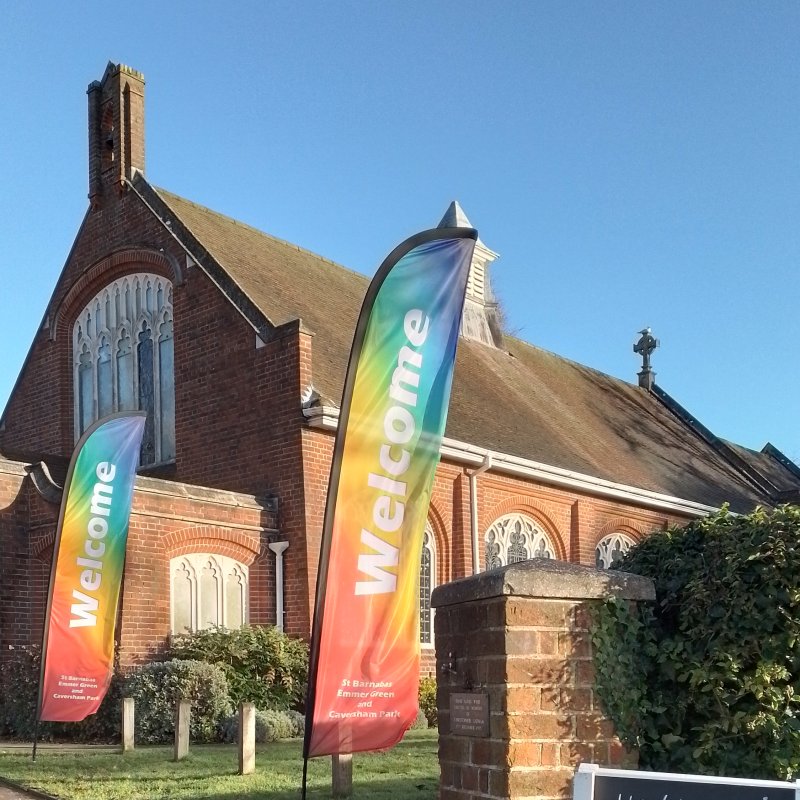 St Barnabas church with Welcome flags
